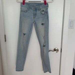 AE light washed jeans (slightly ripped)